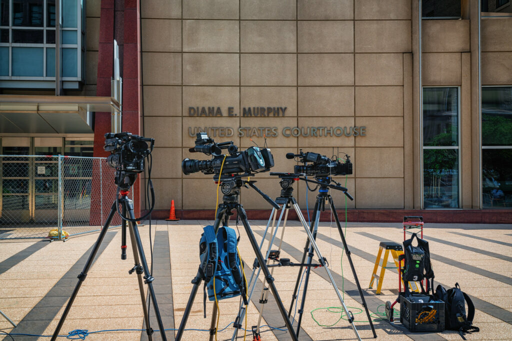 Three cameras placed outside the Diana E. Murphy United States Courthouse. 